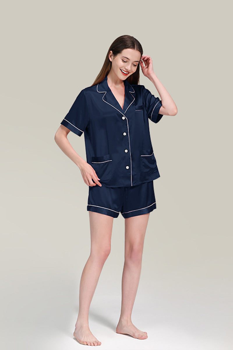 woman wearing navy blue Mulberry Silk buttoned short set pajamas