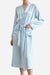 Light blue Mulberry silk nightgown with long sleeves, sash belt, and front pockets in relaxed fit