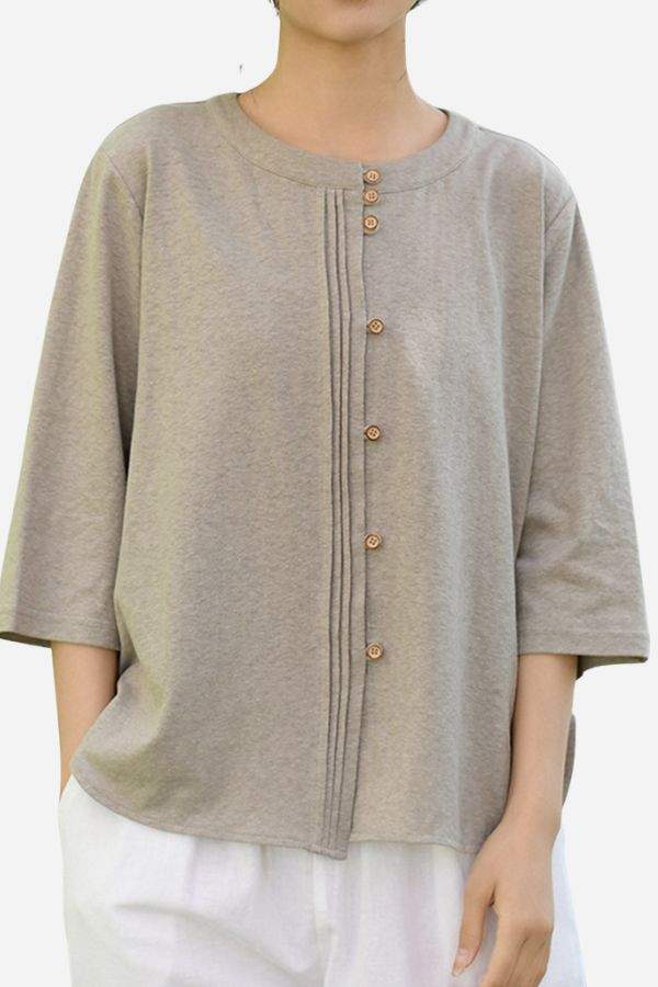 Linen cotton classy eco-friendly women's shirt in neutral tone with wooden buttons and three-quarter sleeves