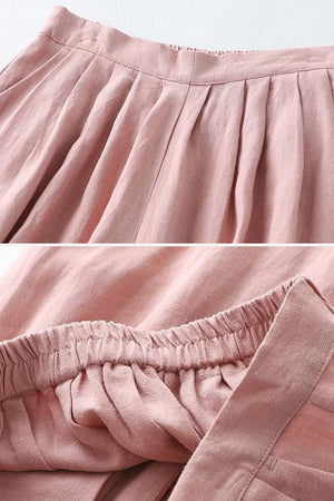 Close-up of pink Ramie Linen Cotton Pants showing waistband and pleated fabric details