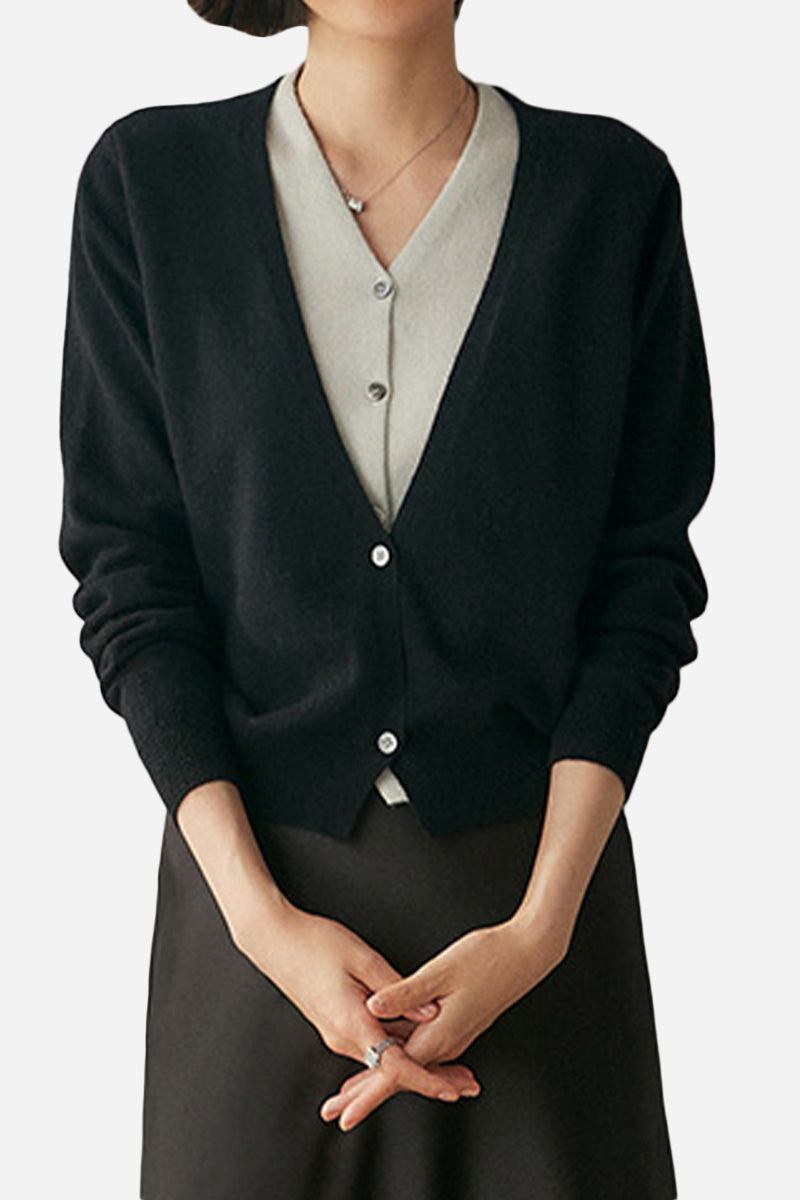Single-breasted cashmere wool cardigan in black with a relaxed fit, lightweight and elegant for versatile layering.