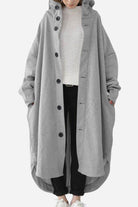 Gray oversized everyday buttoned hooded coat with relaxed fit and roomy pockets, worn over casual outfit
