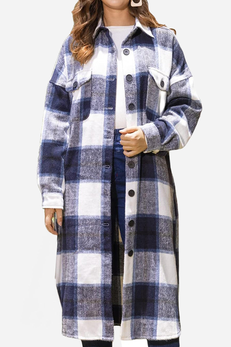 Woman wearing oversized medium-length blue plaid overshirt with buttons and patch pockets