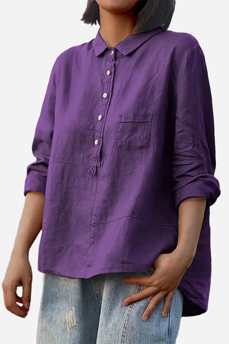 Purple vintage linen shirt with button front and chest pocket, styled casually with rolled-up sleeves and paired with distressed jeans.