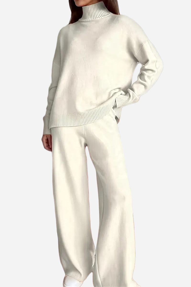 Woman wearing an off-white knitted turtleneck sweater and wide-leg pants two-piece set