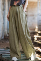 Relaxed fit sandwashed ramie linen pants with elastic waistband and plush lining in olive green