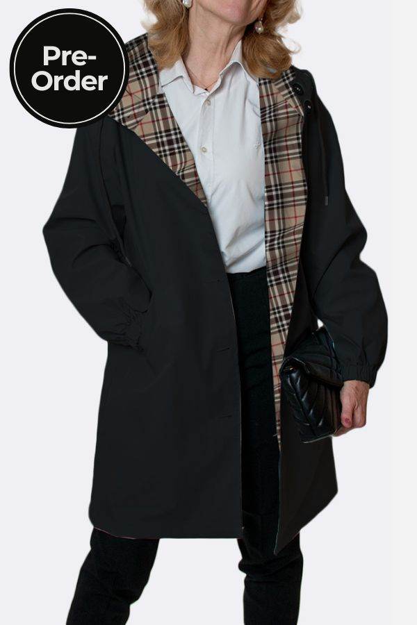 Travel-smart waterproof hooded windbreaker with classic beige plaid lining, adjustable hood, and sealed zippers for rain protection.