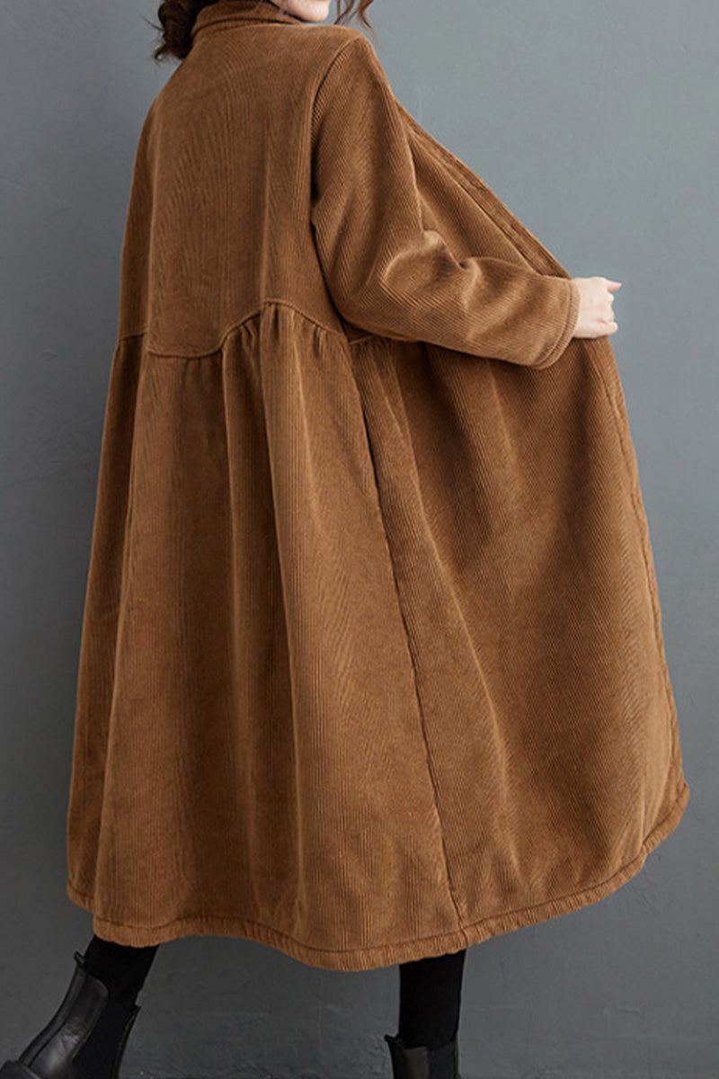 Oversized vintage corduroy coat in warm brown with relaxed fit and rich textured fabric