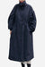 Oversized black cotton stain-resistant coat with high collar and relaxed fit for travel and all-season wear