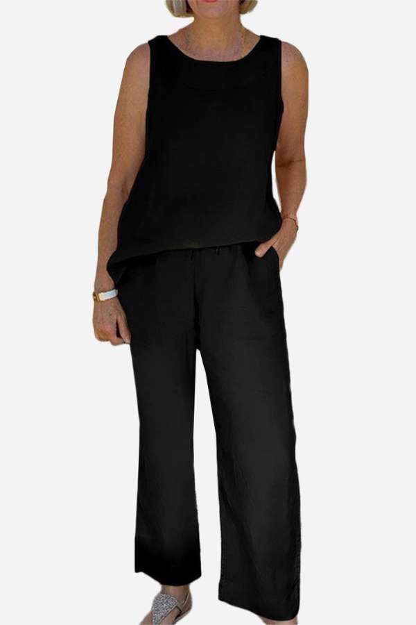 Black sleeveless top and wide-leg pants coordinating set for elegant sleek silhouette