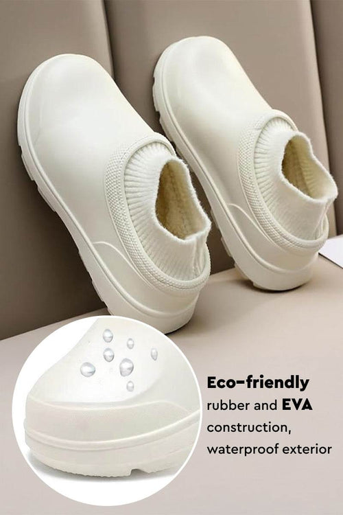 White fleece-lined comfort clogs with waterproof eco-friendly rubber and EVA sole