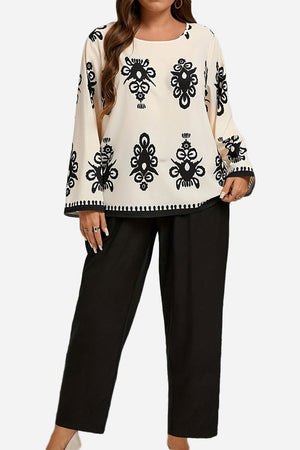 Plus size easy elegance set with black and white patterned long sleeve top and black loose pants
