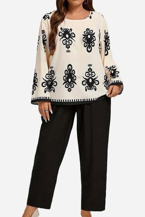 Plus size easy elegance set with black and white patterned long sleeve top and black loose pants