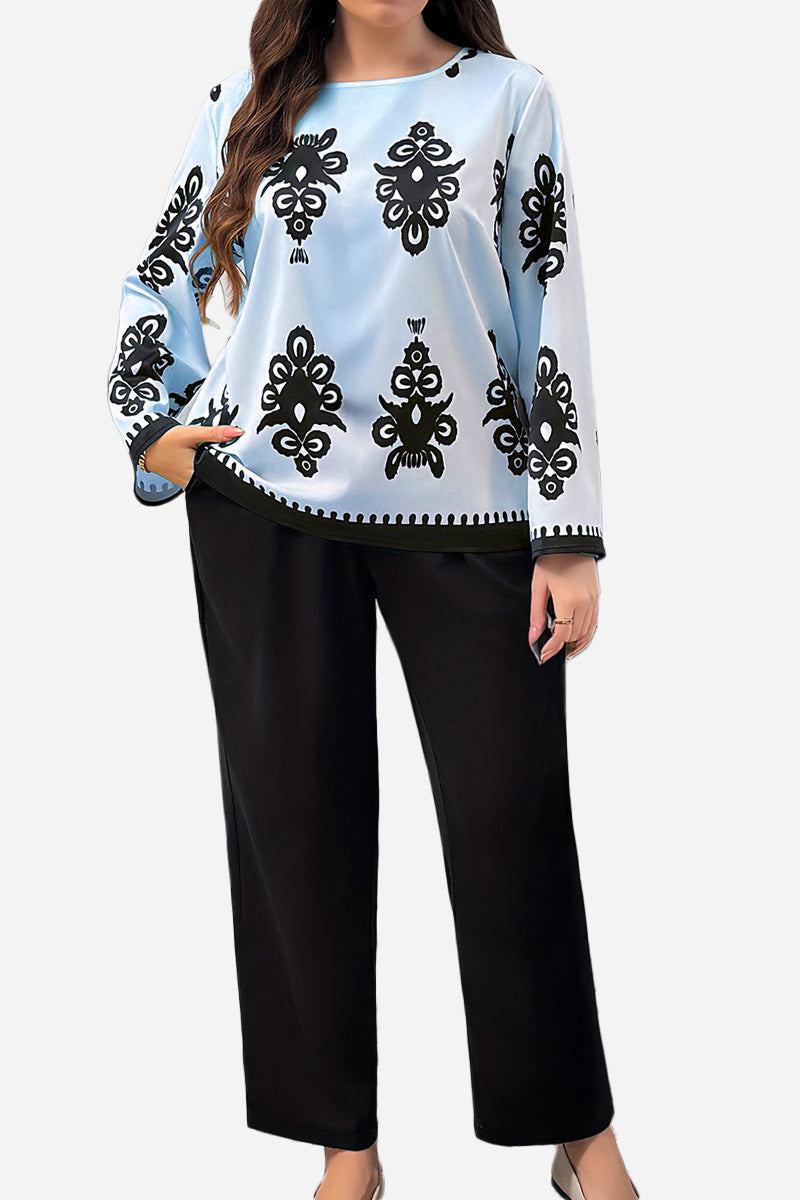 Plus Size Easy Elegance set featuring a light blue long-sleeve top with black intricate prints and black wide-leg pants, designed for comfort and style in plus sizes XL to 4XL.