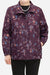 Plus size floral WeatherShield jacket in purple with water-resistant fabric and wind protection, designed for comfort and travel.