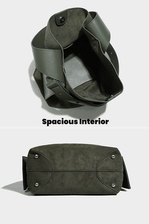 Spacious interior and durable suede bottom of vintage charm bag with dual-length straps for versatile carrying.