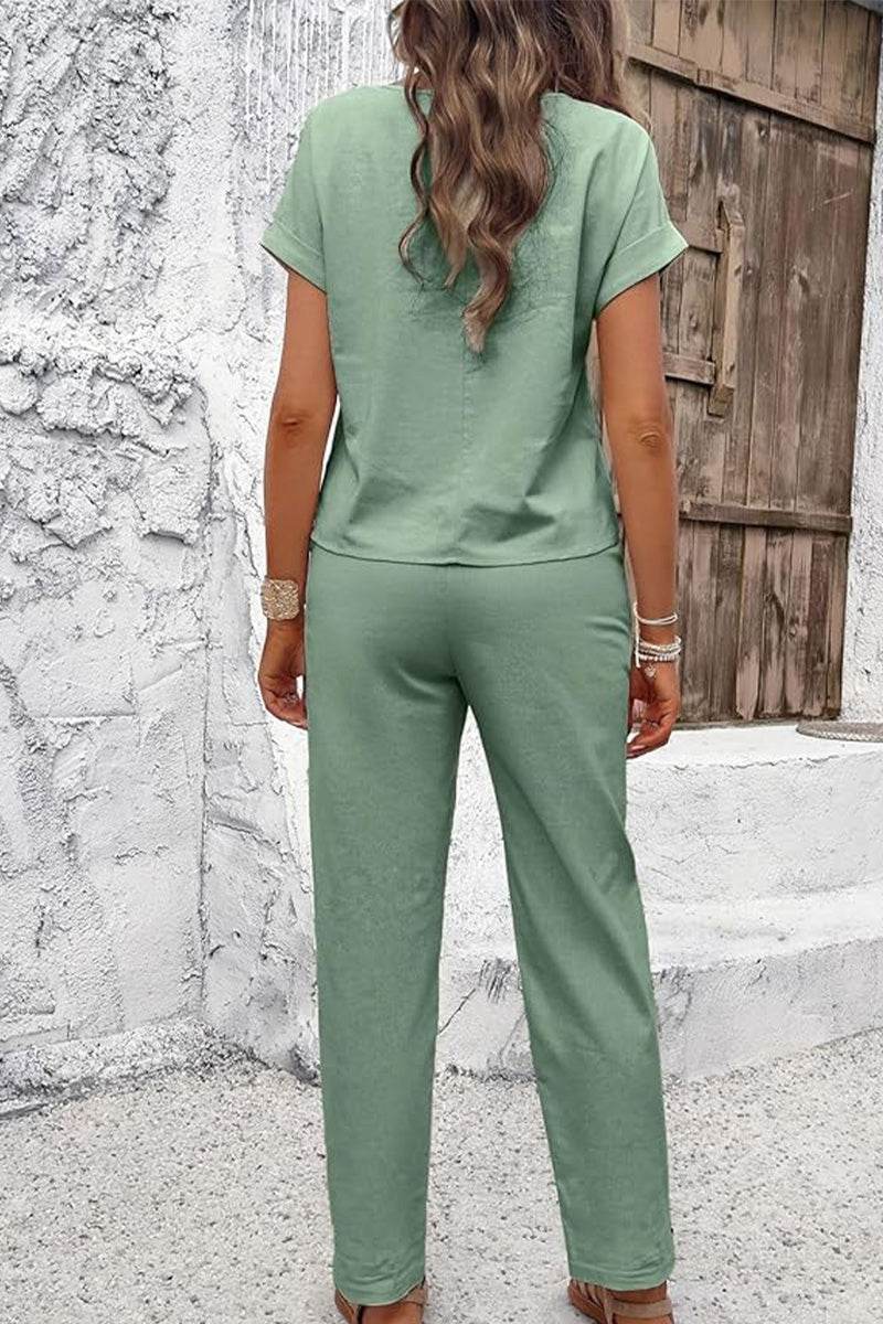 Woman wearing green 100% cotton Total Comfort Two-Piece Set standing outdoors back view