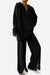 Plus-size black ribbed knit comfort set with zip-up top and wide-leg pants for work from home and casual wear