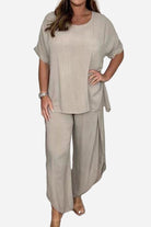 Relaxed linen-like travel 2-piece set in beige with loose fit top and wide-leg pants for comfortable travel wear