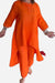 woman wearing breathable and featherlight vibrant orange two-piece lounge set with long top and pants