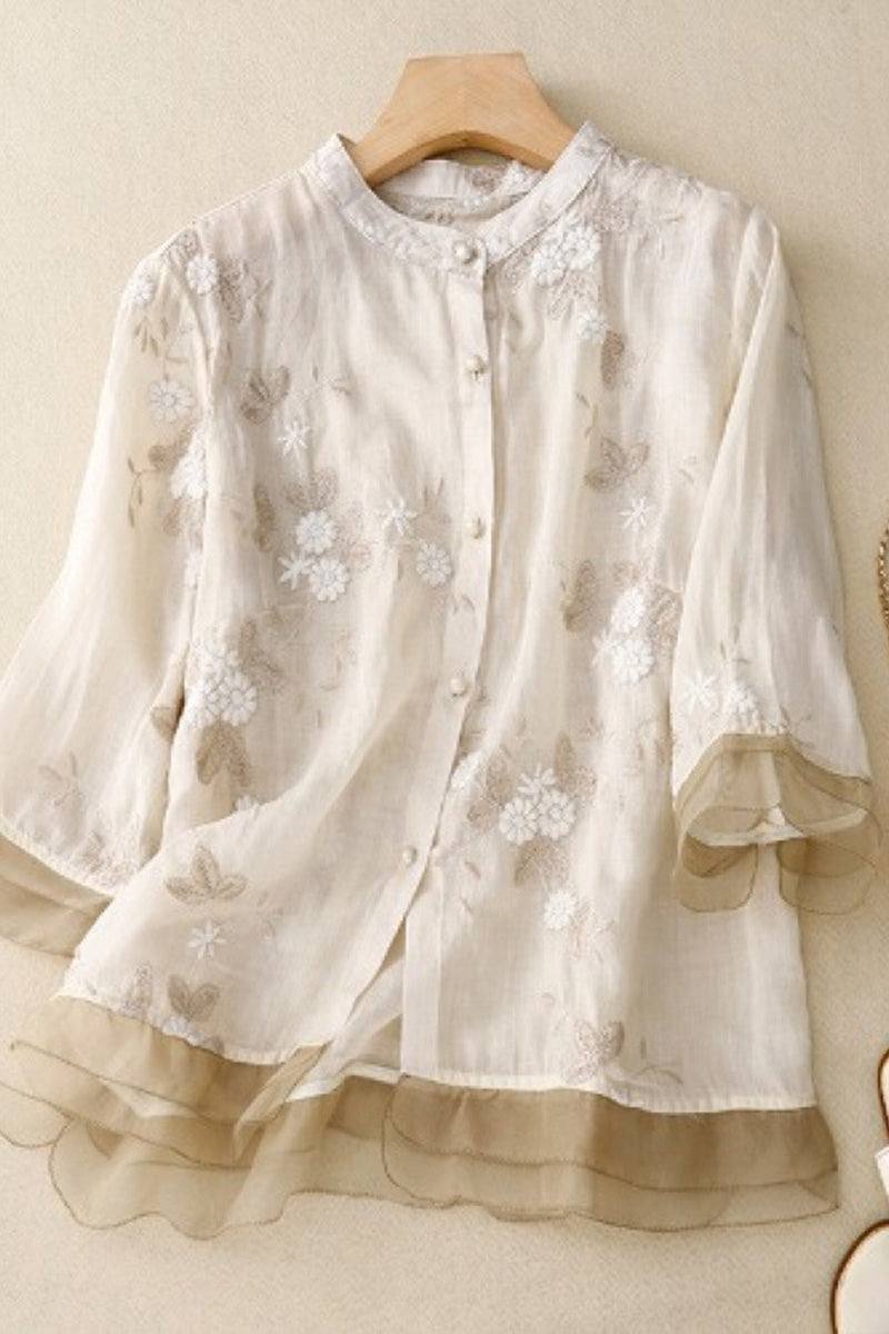 Sheer embroidered cotton linen Tuscany blouse with layered hem and button-up front