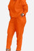 Vibrant orange cotton two-piece set with long sleeves and pants in a comfortable, stretchy fit
