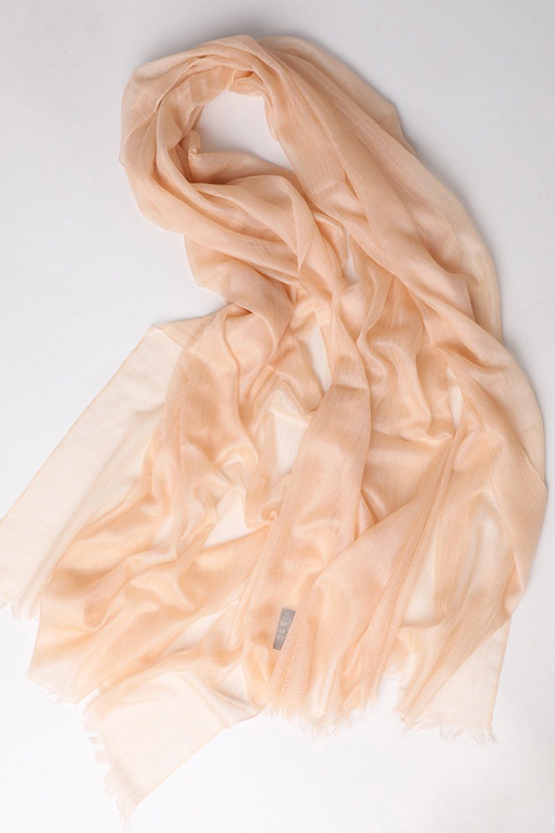 Lightweight 100% cashmere featherlight luxury scarf in soft beige, perfect for year-round wear.