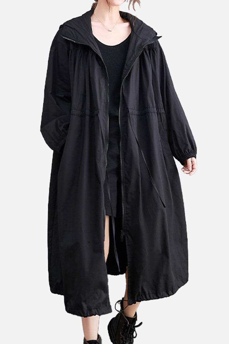 Black oversized all-weather water-resistant windbreaker with hood and long sleeves, loose fit for layering and comfort
