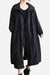 Black oversized all-weather water-resistant windbreaker with hood and long sleeves, loose fit for layering and comfort