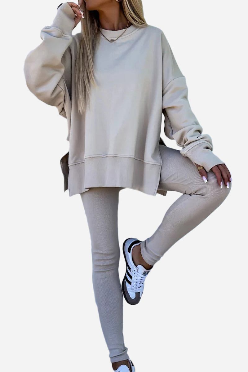Woman wearing beige TimelessChic Ultra Comfortable Two-Piece Set with oversized sweatshirt and fitted leggings paired with white sneakers