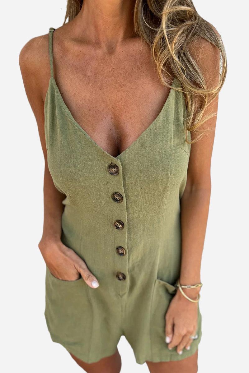 Woman wearing olive green sleeveless 100% pure linen button-front jumpsuit with pockets and adjustable waist tie