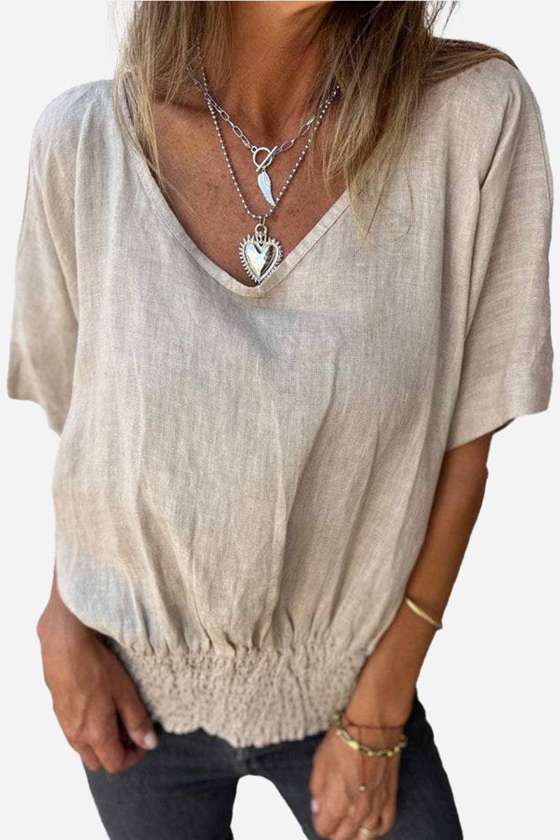 Women's pure linen short-sleeve blouse with V-neck and smocked waist in natural beige color