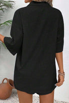 woman wearing black Coastal Linen Cotton two-piece set shirt back view