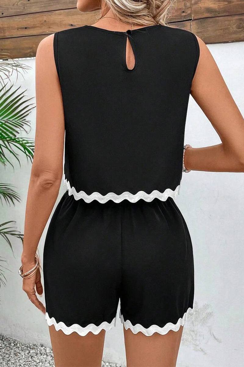 black two-piece set with white scalloped hem, sleeveless top and shorts, coastal style summer outfit