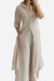 Refined Comfort coordinated wide-leg two-piece set in beige with long draped top and flowy pants for elegant comfort.