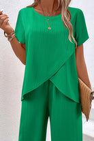 Women's textured elegance two-piece set in green with asymmetrical top and wide-leg pants, soft stretch fabric for all-day comfort