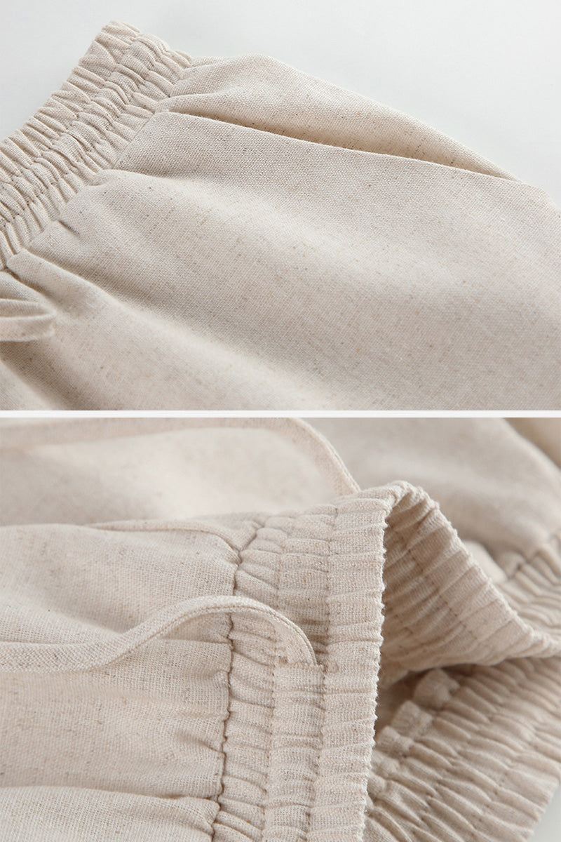 close-up of breathable cotton-linen blend fabric with elastic waistband detail