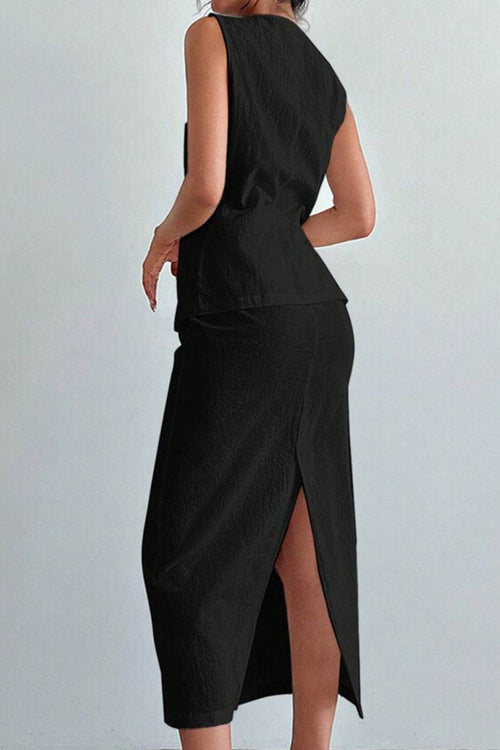 Back view of woman wearing black flattering cotton-linen blend sleeveless vest and high-waisted skirt two-piece outfit