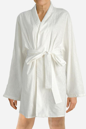 White cotton-linen blend luxury spa robe with kimono sleeves and waist tie belt on model