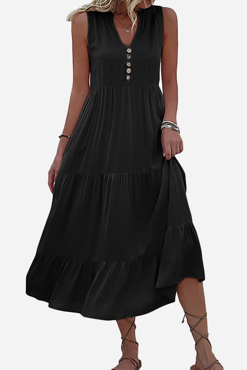 Bohemian tiered midi dress with V-neck button detail in black on model