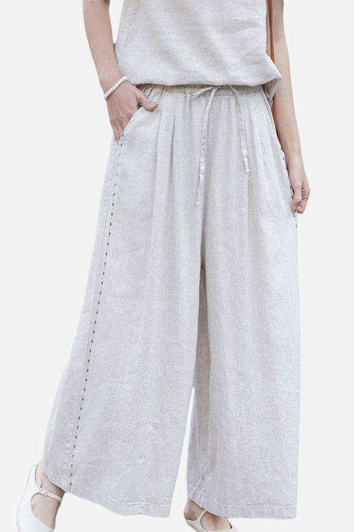 100% linen wide-leg pants with elastic waist and relaxed fit for all-day comfort and breathability