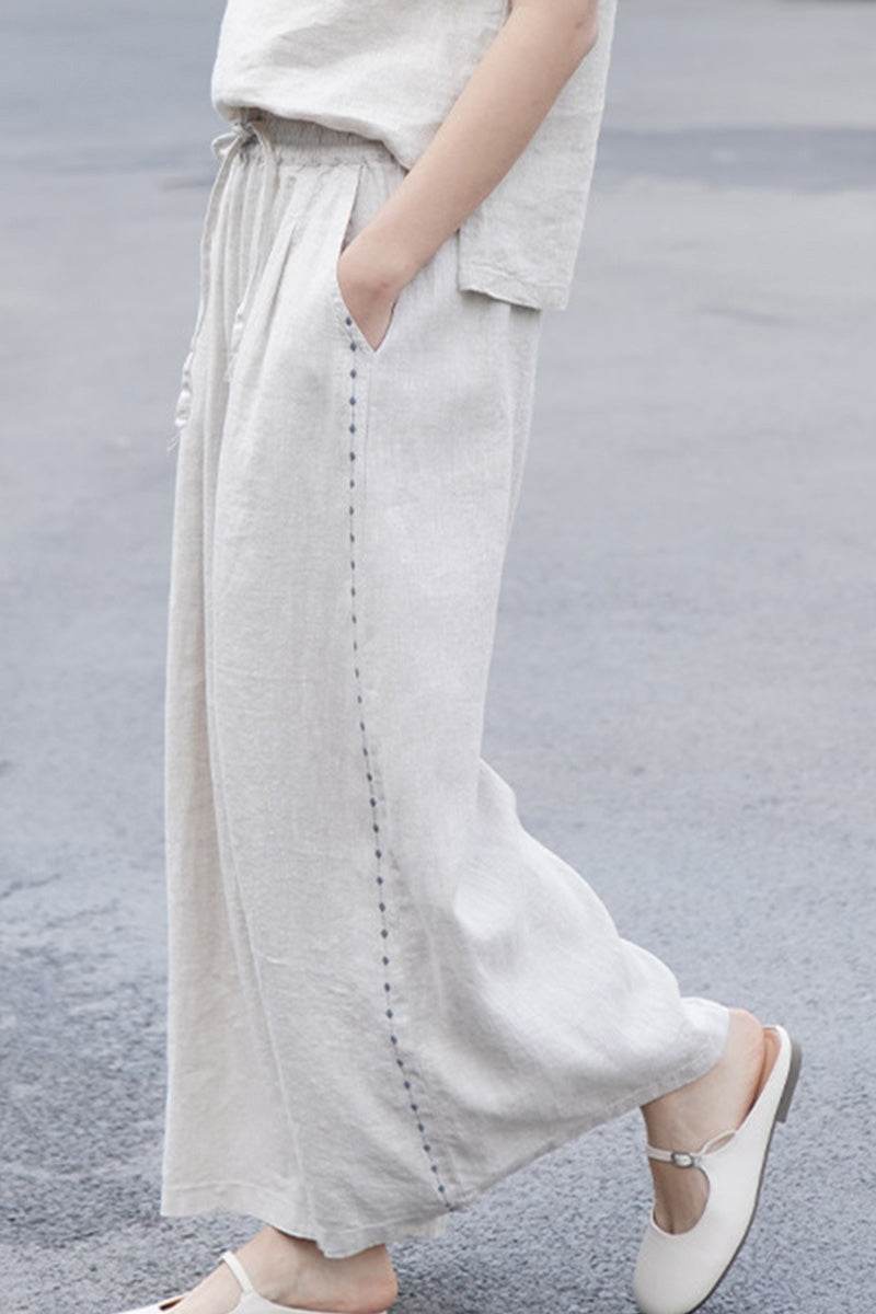 100% linen wide-leg pants with elastic waist and breathable fabric for comfortable, stylish wear