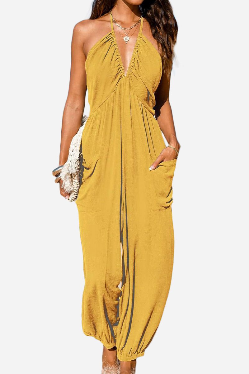 Sunshine On Sand halter-neck mustard yellow jumpsuit with ruched neckline and elastic ankle cuffs