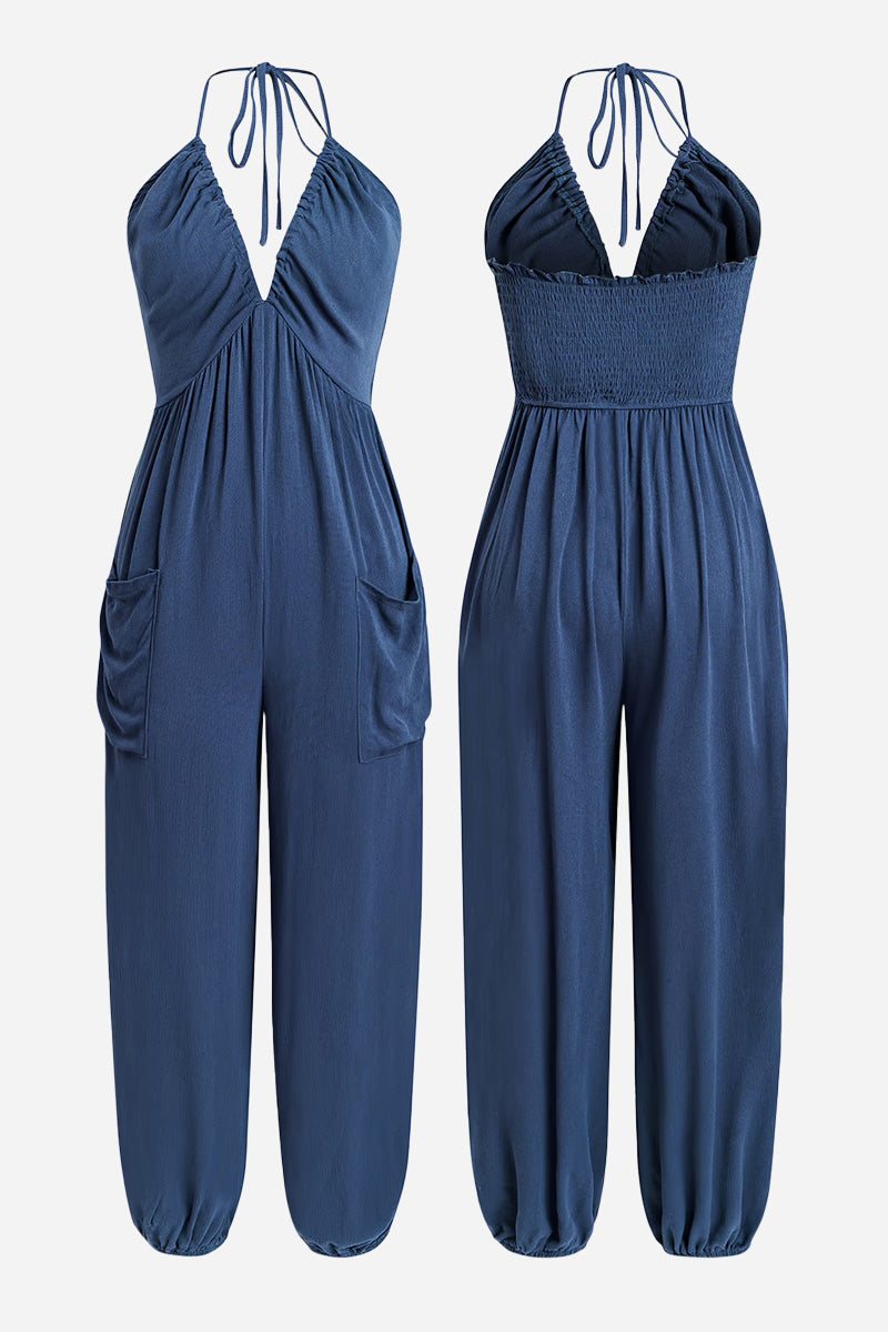 Sunshine On Sand navy blue halter-neck jumpsuit with ruched neckline and elastic ankle cuffs
