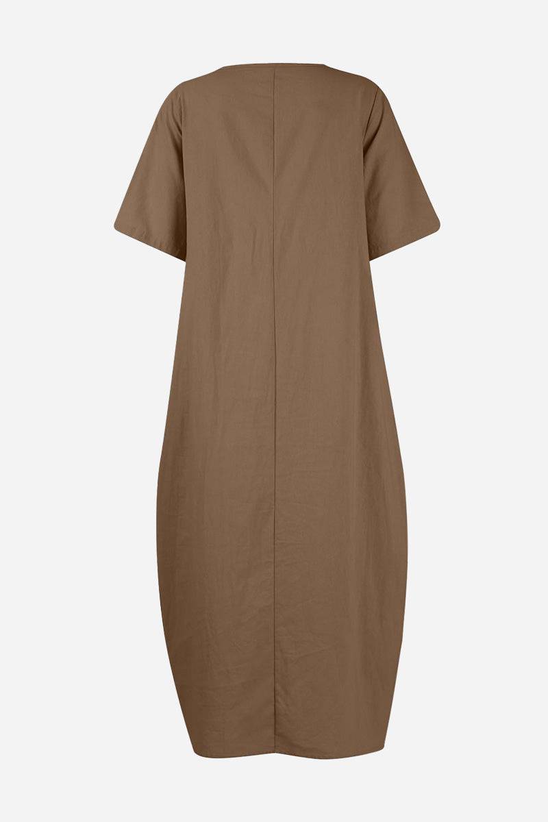 Breeze Cocoon Dress in brown with relaxed cocoon silhouette and short rolled sleeves, back view