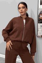 The Voyager Zip Set brown zip-front sweatshirt and wide-leg joggers travel outfit for women