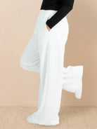 Two-piece easy airport lounge set in soft wrinkle-resistant fabric designed for travel comfort and relaxed fit