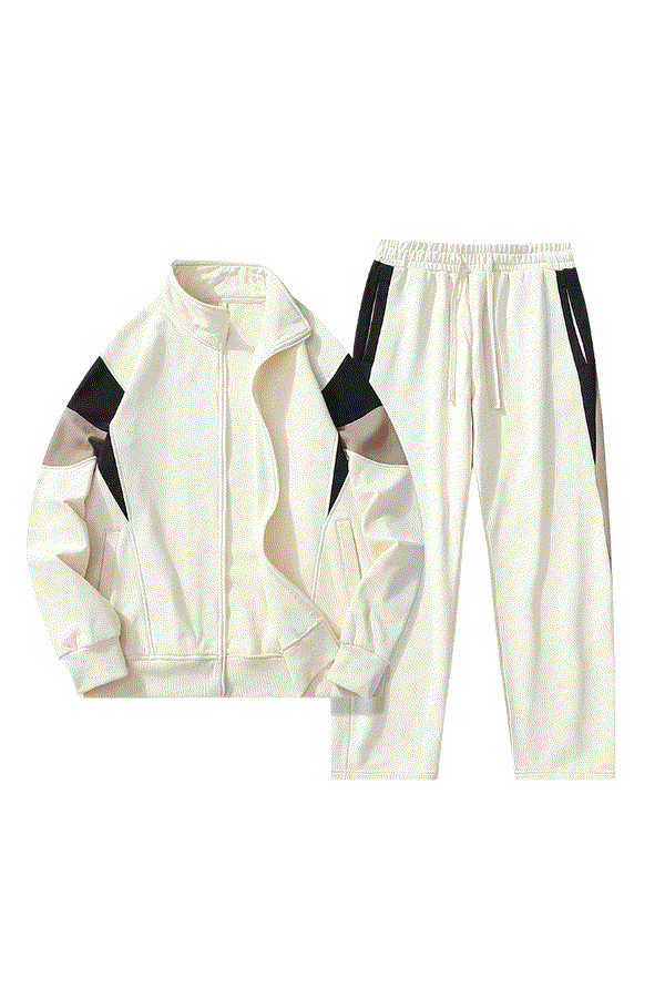 Comfort in Motion lightweight white athleisure tracksuit set with black and taupe accents for travel and active wear
