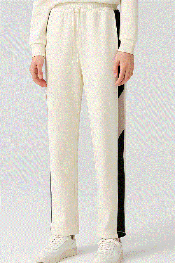 Comfort in Motion white athleisure tracksuit pants with black side stripes and elastic waist