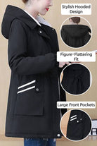 Black Cityscape Comfort Hooded Windbreaker with plush lining, figure-flattering fit, large front pockets, and stylish hooded design for cozy cold-weather wear.